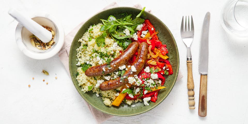 Lamsmerguez met kruidencouscous en gestoofde paprika met feta | Maaltijdbox recepten